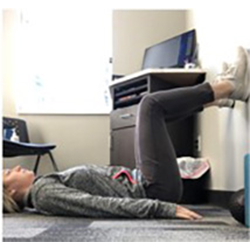 Chiropractic Appleton WI Callie Huft Floor Posture Exercise