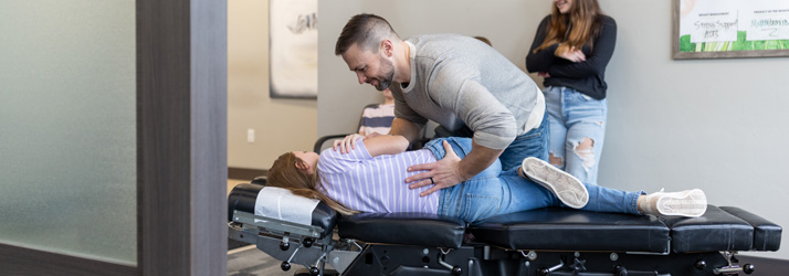 Chiropractor Appleton WI Brent Buss Adjusting Patients Back