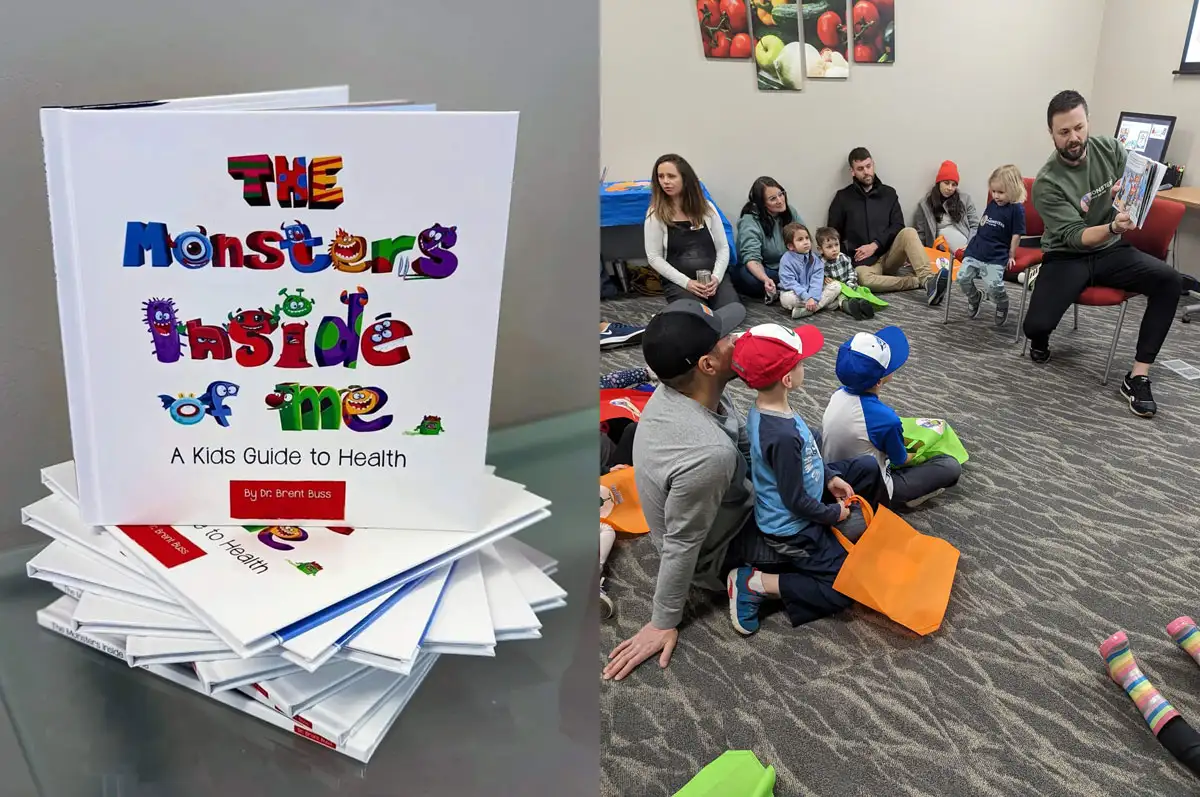 Chiropractor Appleton WI Brent Buss Reading A Book to Children