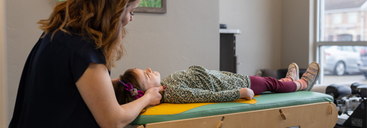 Chiropractor Appleton WI Marissa Moloney Adjusting Child
