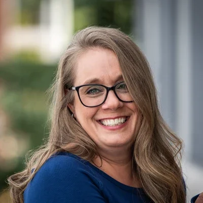 A headshot photo of Jess