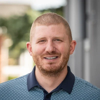 A headshot photo of Michael