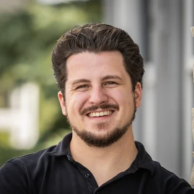 A headshot photo of Noah