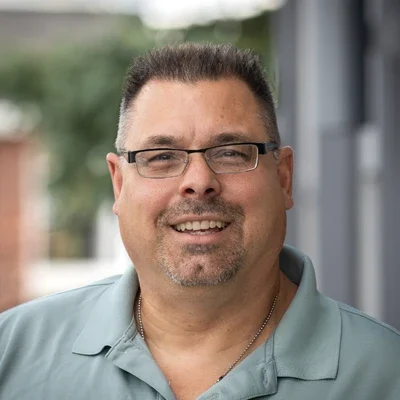 A headshot photo of Dr. Dan