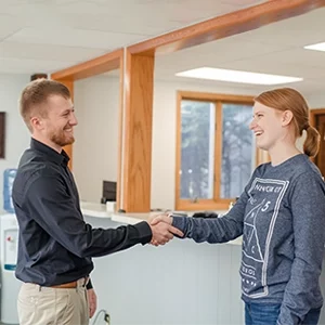 Chiropractor Oconto WI Jacob Bloch With Happy Patient